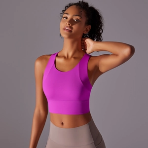 Close-up of purple yoga sports bra with integrated cups and cross back design