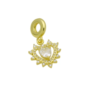 Macro view of golden heart pendant with white zircon stones and sparkling finish