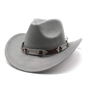 Detail of grey western cowboy hat featuring leather band with brass rivets on wool felt