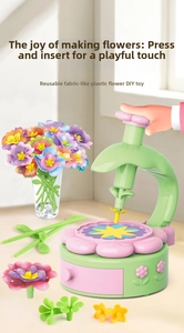 DIY garden building set with flower press and colorful petals for creative children crafting