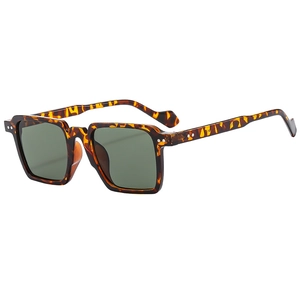 Classic tortoise shell square frame sunglasses with green lenses and silver rivets