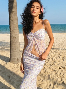 Sexy double-layer floral mesh set with spaghetti strap top and midi skirt on a beach