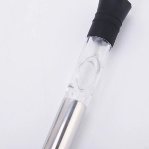 Detailed close-up of stainless steel wine chiller stick with rubber stopper and pourer