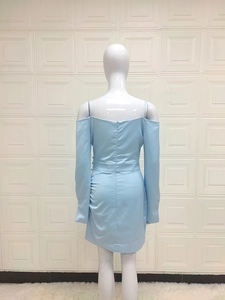 Detail view of the back zipper closure on this light blue off-shoulder slim-fit mini dress