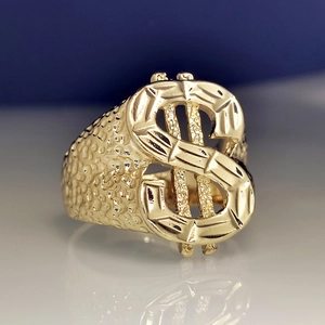 Hip hop style 18k gold plated ring featuring a bold dollar sign and hammered metal texture
