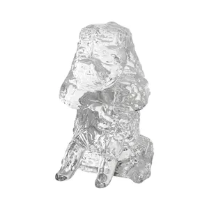 Close-up of a clear crystal poodle figurine with intricate textured glass details