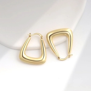 Polished gold U-shaped hoop earrings with a minimalist geometric hollow design for women