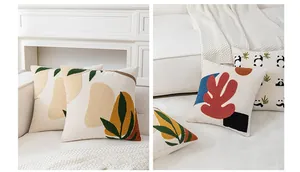 Detailed view of tufted panda embroidery on velvet pillow cover with textured fabric