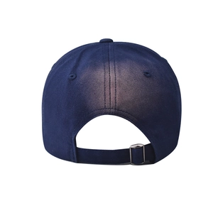 Detail view of the back of navy cotton baseball cap with adjustable metal buckle strap