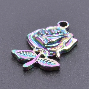 Macro shot of 3D rainbow plated stainless steel rose flower pendant for jewelry making