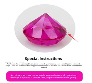 Detail view of pink acrylic diamond showing the injection molding port on the edge