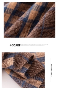 Close-up of soft blue and camel plaid faux cashmere scarf showing fine woven texture