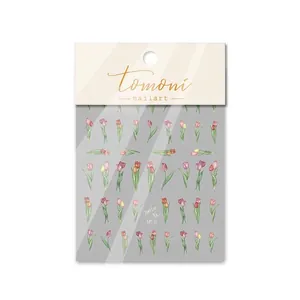 Detail showing 5D embossed tulip nail art stickers with plaid patterns in retail packaging