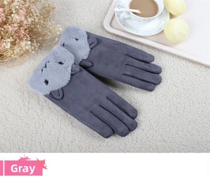 Detail view of winter gloves with cute cat faux fur trim and touchscreen material