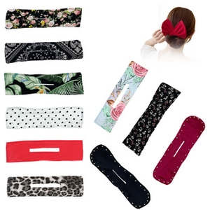 Detail view of floral and leopard pattern deft buns for effortless hair styling