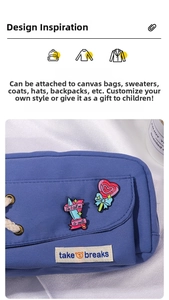 Cartoon enamel pins with pink heart candy and sassy slogan on blue canvas bag