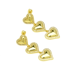 Detail of three-tier gold-plated heart earrings featuring sparkling cubic zirconia stones