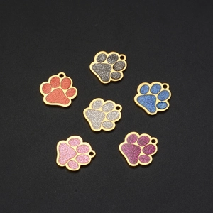 Stainless steel pet ID tags with colorful glitter paw prints in multiple colors