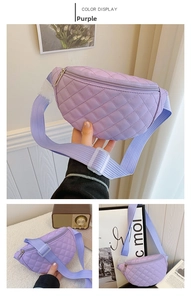 Detail of purple quilted chest bag for kids featuring a lattice pattern and adjustable strap