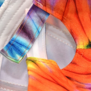 Close-up of colorful tie-dye baseball cap back strap with clean stitching details