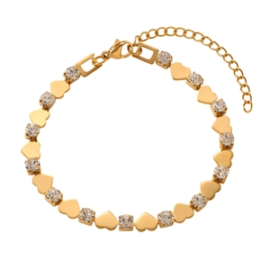 Detail of gold heart-shaped link bracelet with sparkling round cubic zirconia stones