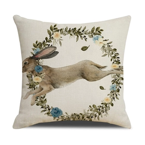 Osterhasen Kissenhülle mit Aquarell Blumenkranz und Hasenmotiv auf Leinenstoff Dekor