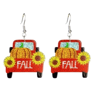 Glittery red truck earrings with pumpkins, sunflowers, and FALL text for Thanksgiving