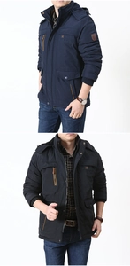 Detail of dark blue hooded parka with faux fur collar and embroidered logo