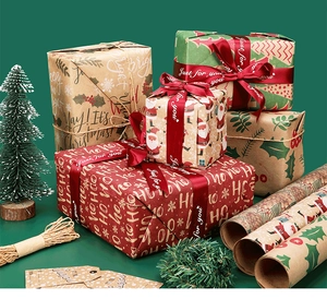 Detail of vintage Christmas wrapping paper set with red ribbons and festive kraft tags