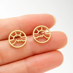 Gold stainless steel round earrings with hollow mountain and sun landscape design