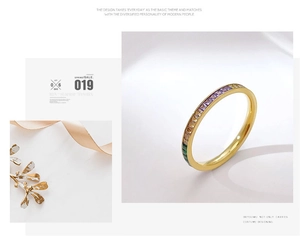 Fashionable gold ring detail with colorful square-cut zircon stones in rainbow palette