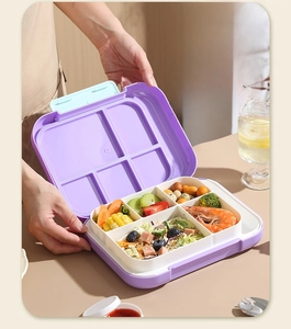Detailed view of purple lunch box showing leak-proof seal ring and multiple compartments