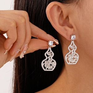 Silver gourd earrings with hollow rose pattern and micro-set cubic zirconia stones
