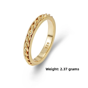 Macro detail of gold plated S925 silver twist ring showing the 925 purity hallmark