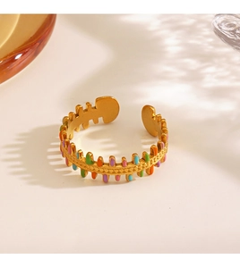 Detail of multi-color enamel fishbone ring in 18K gold plating with adjustable opening