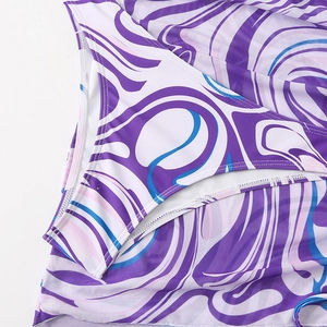 Close-up of purple marble print bikini fabric with high-quality flat seam stitching details