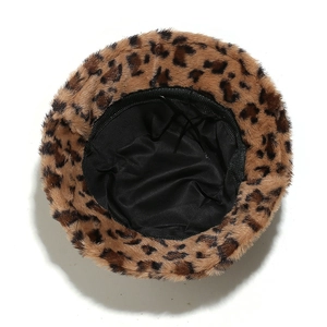 Detail view of leopard print bucket hat showing soft faux fur texture and black inner lining