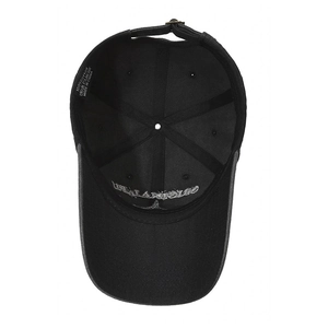 Inside view of a washed distressed black baseball cap with shark logo embroidery