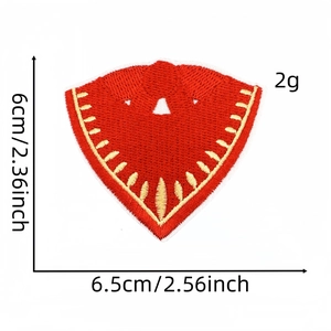 Detail of red cactus shield embroidered patch with dimensions 6cm by 6.5cm on white base