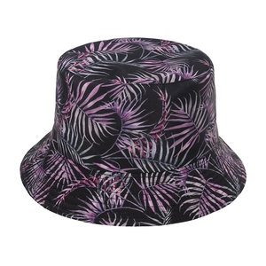 Classic black bucket hat with pink palm leaf print for outdoor sun protection