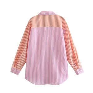 Women's pink and orange vertical striped long sleeve shirt with a curved hemline