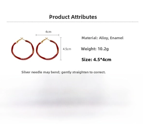 Detailed macro view of red enamel twisted hoop earrings with alloy material dimensions