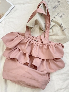 Pink bud tote bag with ruffle trim layers, soft fabric crossbody shoulder bag for women