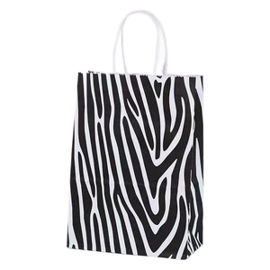 Sac cadeau en papier kraft imprimé zèbre avec poignées blanches pour shopping et fêtes