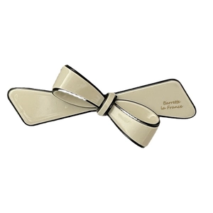 French style beige bow hair clip with black edges and gold Barrette La France lettering