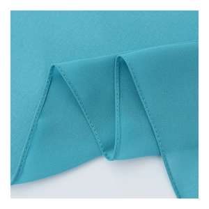 Lake blue chiffon hijab scarf with premium texture and delicate rolled edge stitching