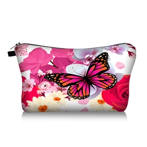 Detail of butterfly and floral print makeup bag with durable zipper and pink pattern