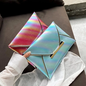 Detailed view of colorful holographic envelope clutches in pink and blue gradient PU leather