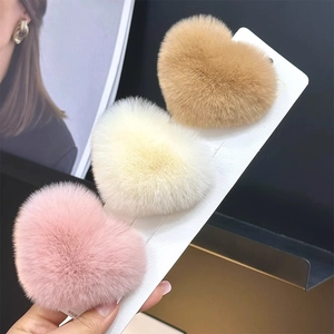 Three heart-shaped plush faux fur hair clips in brown beige and pink colors set