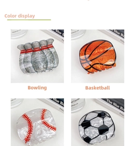 Detail view of acetate claw clips in bowling, basketball, baseball and soccer ball designs